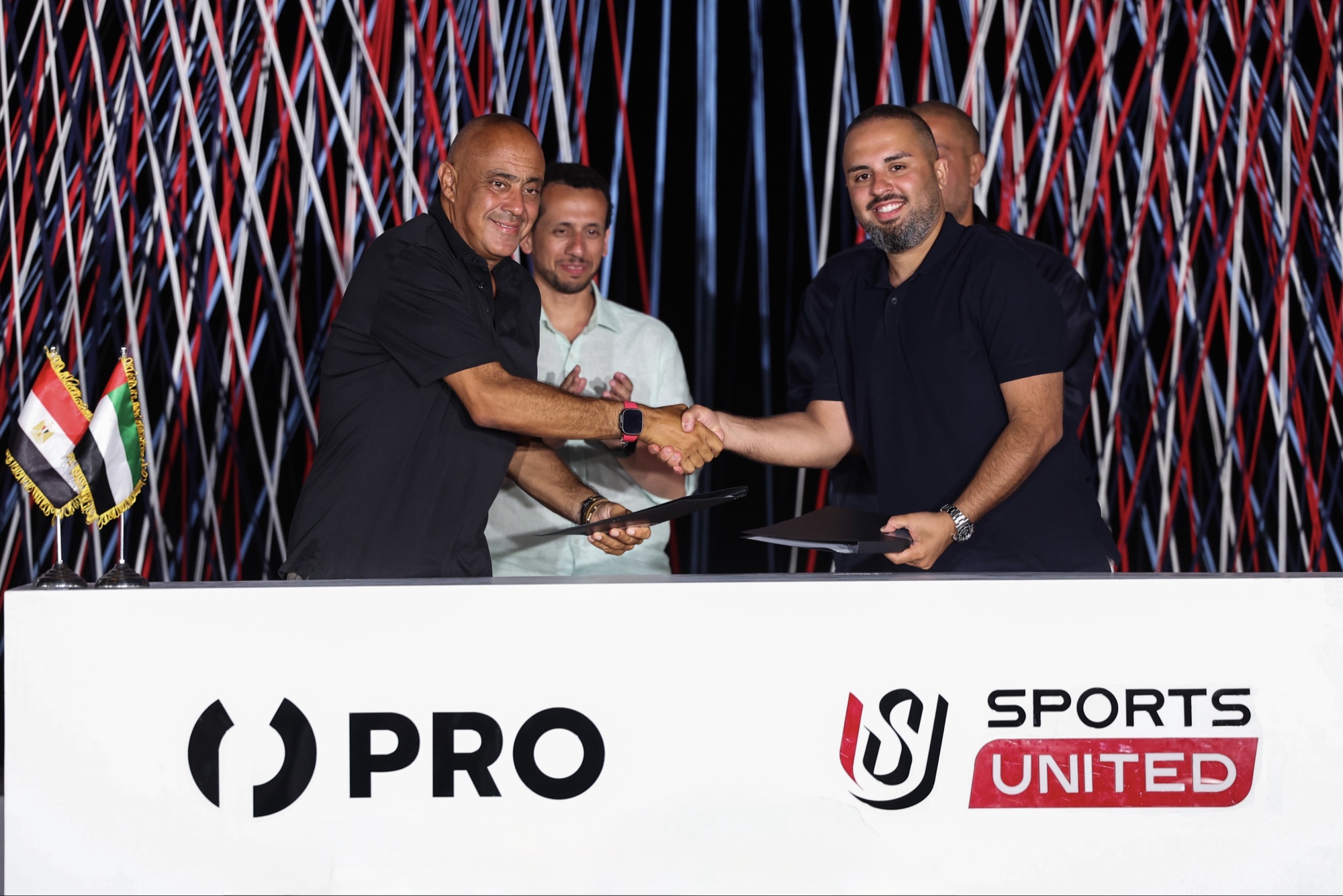 Handshake between PRO and Sports United